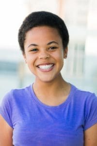 Young lady smiling broadly