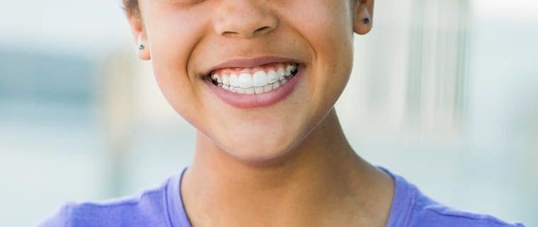 Young lady smiling broadly