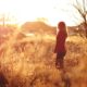 woman in sunset field