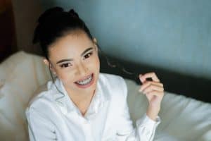 woman with braces smiling