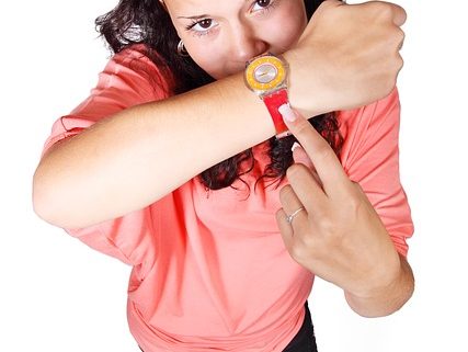 woman checking watch