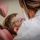 Doctor Checking little boy's teeth