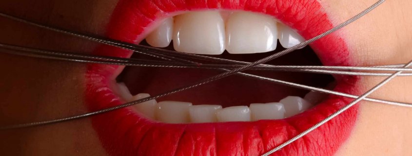 closeup-photo-of-a-woman-with-gray-cables